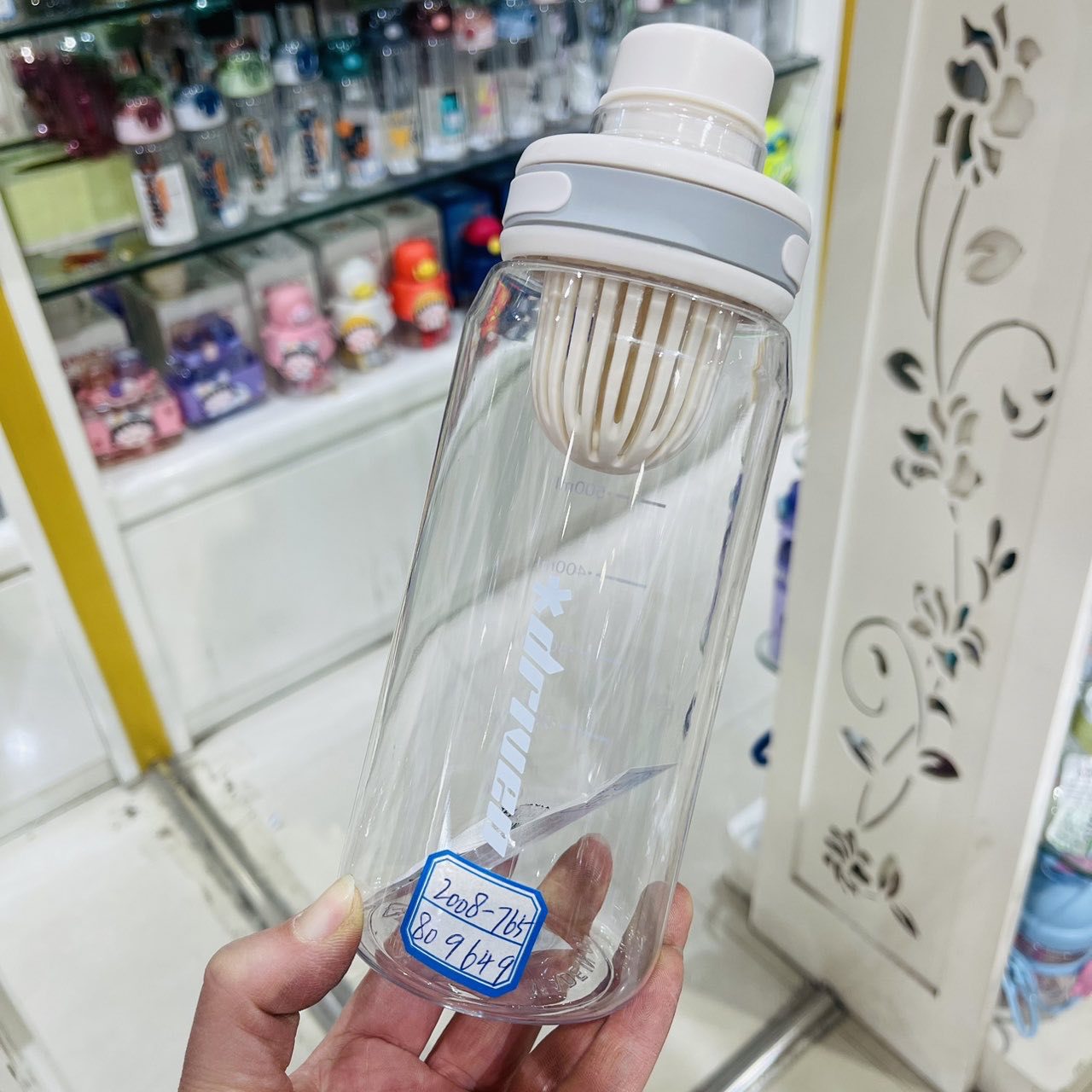 Jinshi deportivo al aire libre de una sola capa de plástico 1000ml taza espacial de gran capacidad torsión tapa de taza espacial de trabajadores de agua