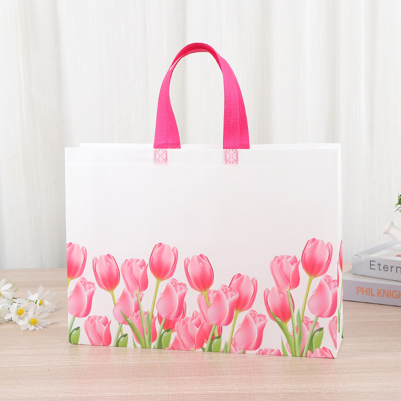 Bolso grueso de tela no tejida Bolso de compras de ropa no tejida para hombre Bolso de mano de regalo con impresión en color de película