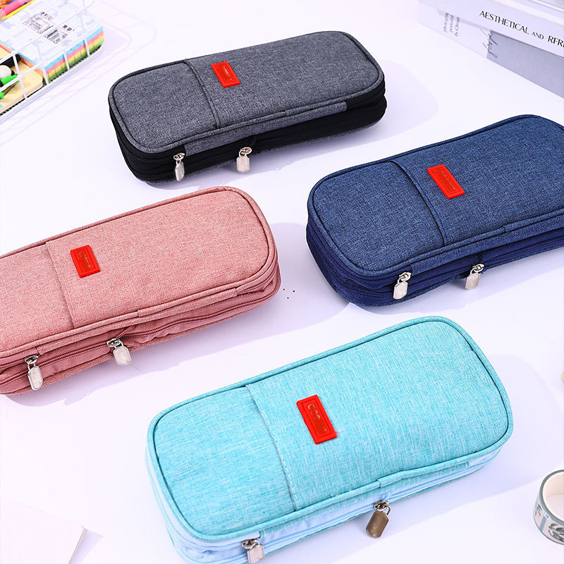 Nuevo estilo transfronterizo de alto valor, estilo japonés y coreano, bolsa de lápices retráctil expandible de color sólido, bolsa de papelería de doble capa de gran capacidad