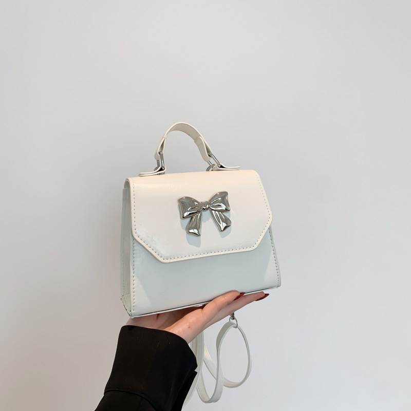 2025 nuevo estilo francés personalidad mochila de hombro de mujer alta sensación de moda simple de hombro de mano pequeña bolsa de mano coreana