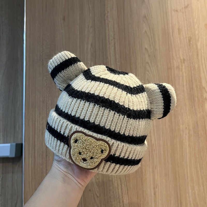赤ちゃんの秋冬の韓国版の子供のニットの帽子の男女の赤ちゃんのストライプの熊の頭の毛糸の帽子の巻きの辺の瓜の皮の保温の帽子|undefined