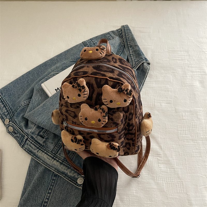 Nicho Hot Girl nueva mochila de dibujos animados con patrón de leopardo para almacenar mochila de peluche de viaje al aire libre