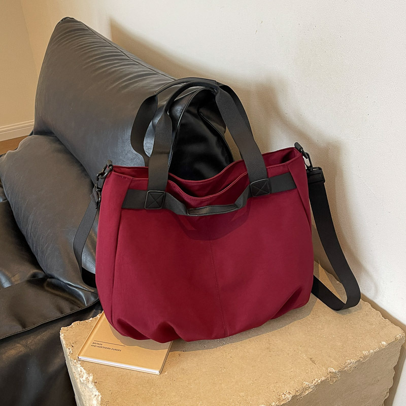 Bolsos de viaje transfronterizos de gran capacidad Bolsos de tela Oxford simples de moda femenina Bolsos tote de todo fósforo Bolsos de hombro de moda coreana