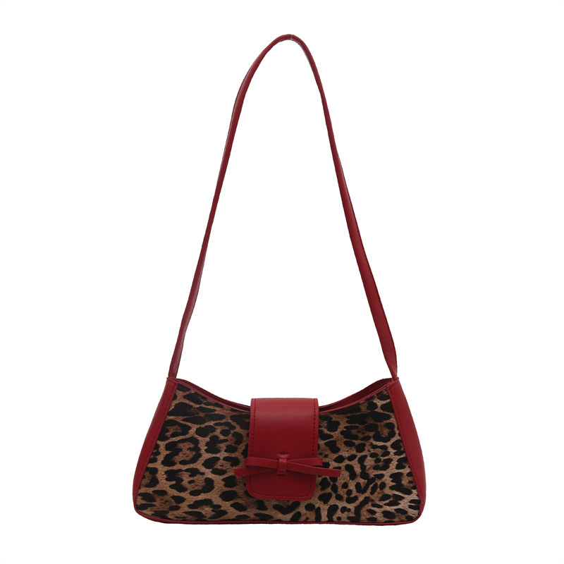 Bolsa de moda bajo la axila para mujeres de gran capacidad 2025 primavera nueva moda nicho bolso de hombro bolso de arco bolso de mano