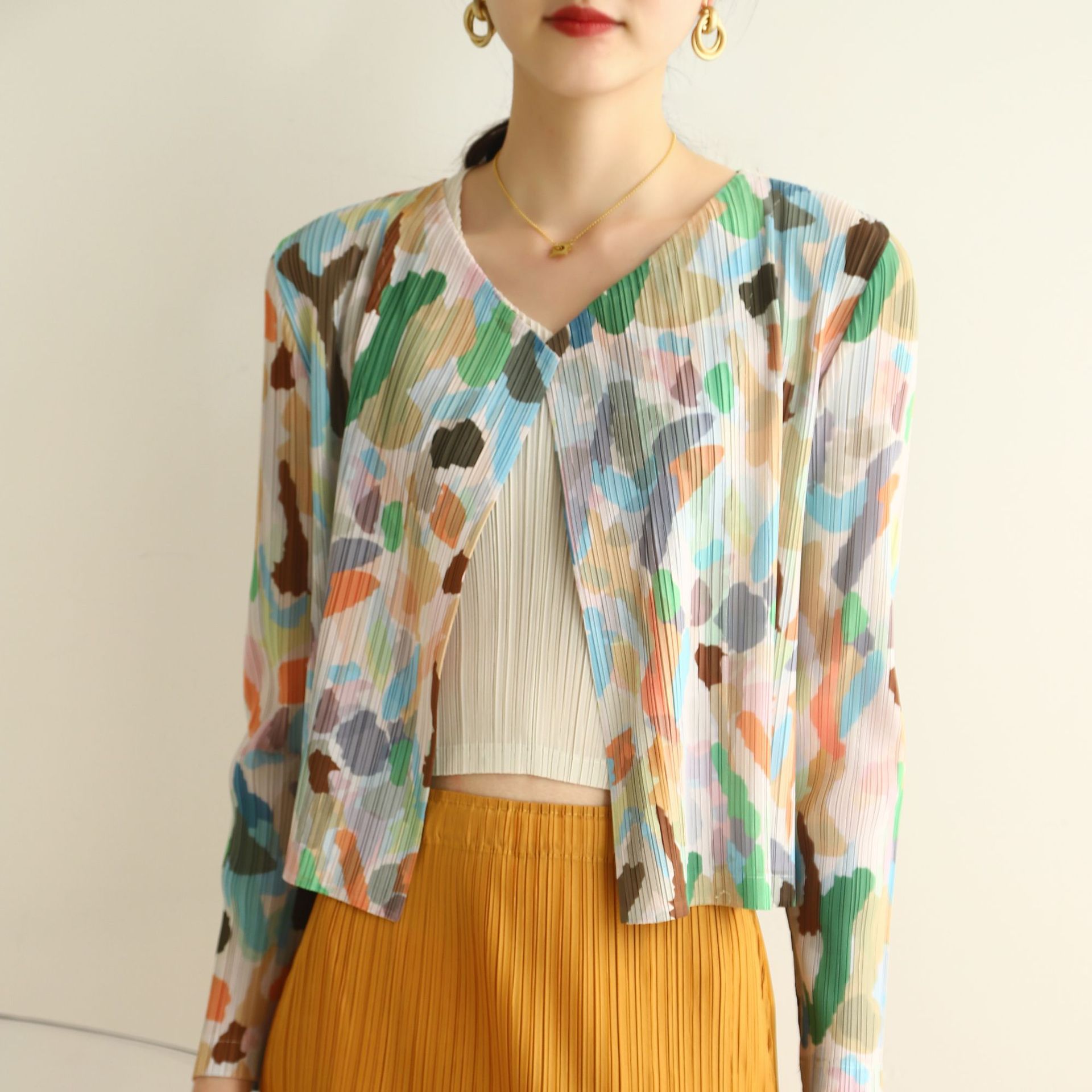 Contador de calidad 2022 otoño y primavera de alta gama plisada moda impresa cardigan versátil casual abrigo corto plisado