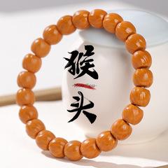 逸品の猿の頭のクルミの高山のもとの種はまっすぐに蛇口の虎のひげの手を切って高級な木目のブレスレットの文を刺して仏珠の卸売りを遊びます。