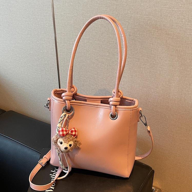 Bolso de hombro universal super caliente para mujeres 2025, nuevo diseño de moda, bolso de mano de alta calidad, bolso de cubo de agua.