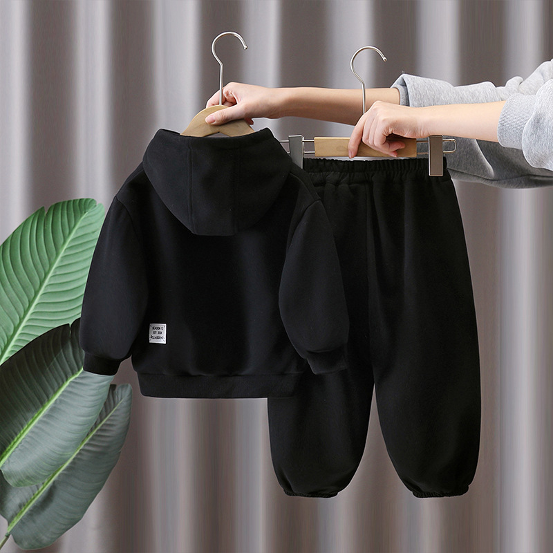 7785 Traje deportivo para niños Primavera y otoño 2025 Nuevo suéter con capucha con estampado de letras para niños Conjunto de dos piezas de primavera