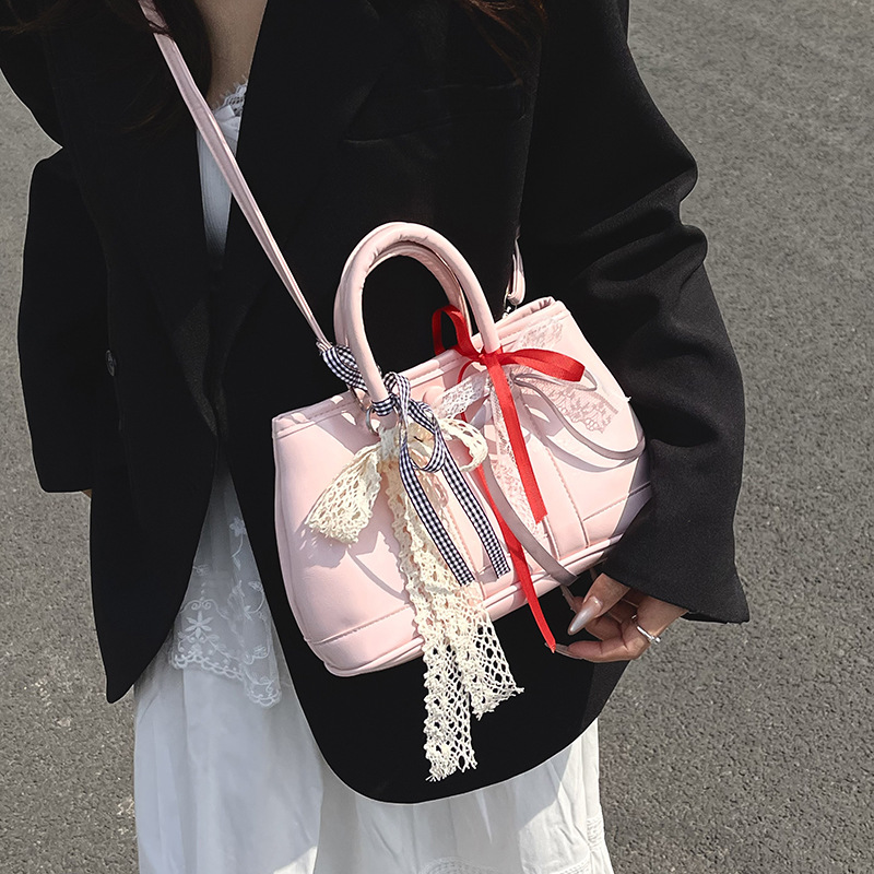 Bolsos de jardín portátiles populares de este año para mujer 2025 nuevos productos bolsos de hombro coreanos de nicho bolsos de cubo de todo fósforo de alta gama