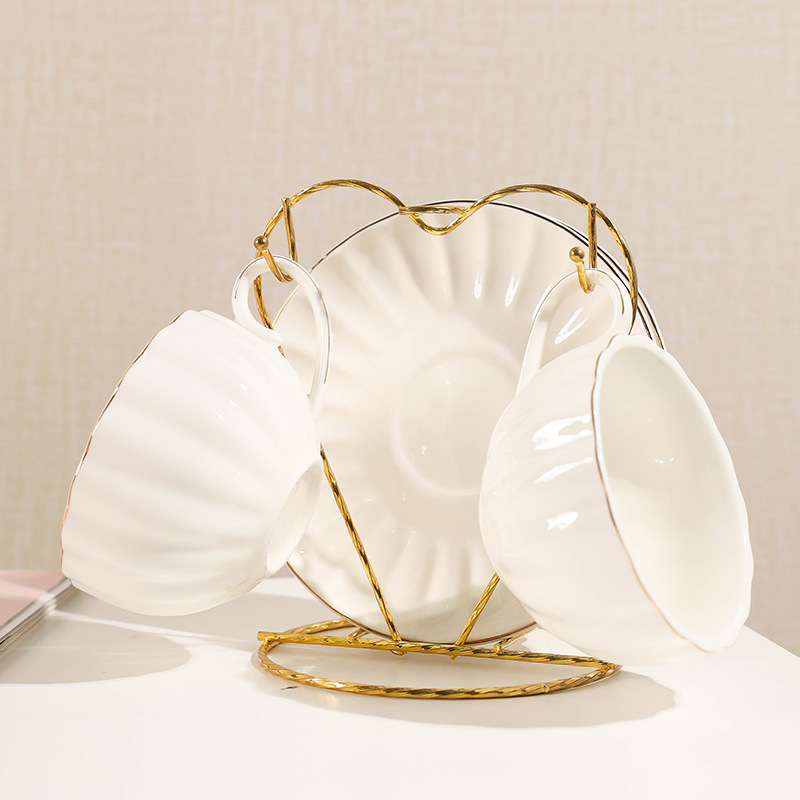 Comercio exterior de cerámica taza de café platillo juego de té regalo simple flor taza de té hogar taza de agua café traje de regalo con estante