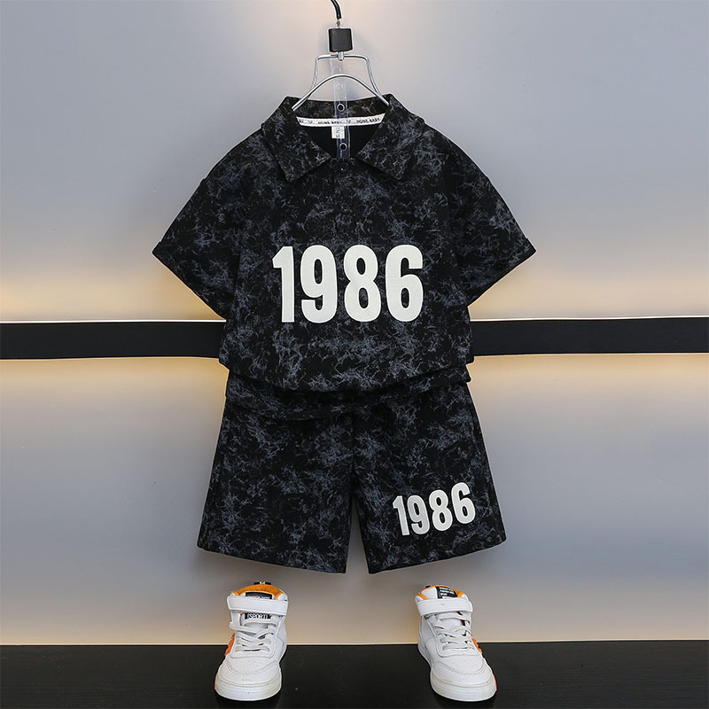 7189 ropa de verano para niños 2025 nuevo traje deportivo de camisa polo para niños de manga corta para niños de mediana edad y grandes