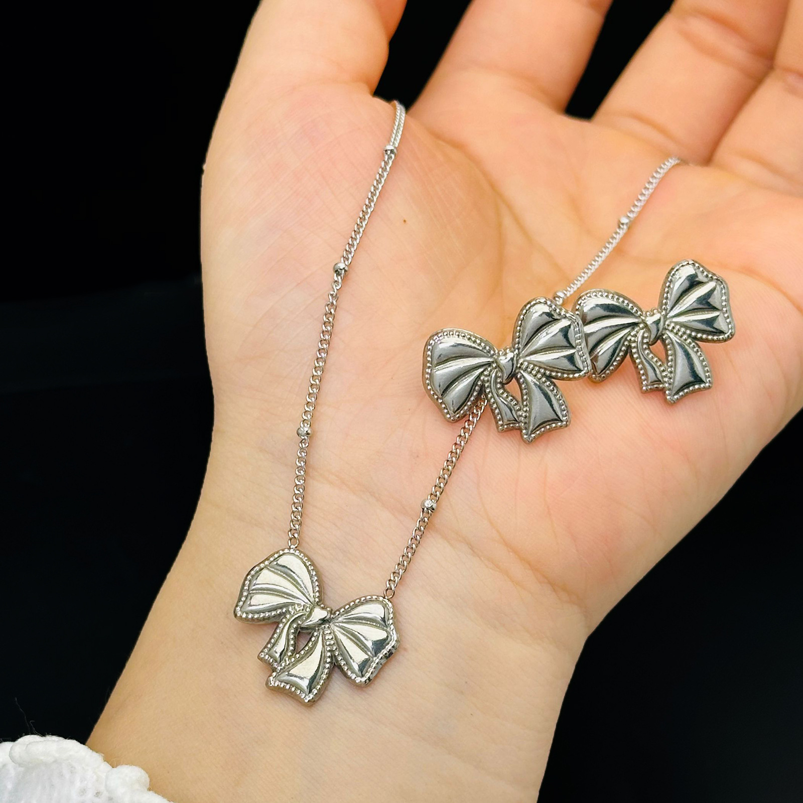 Bow set pendientes ligero lujoso estilo transfronterizo colgante de acero de titanio no decolor 18K joyas de oro ins