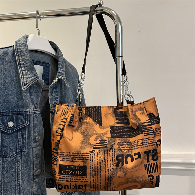 Bolsa de hombro de moda moda para mujeres 2025 nueva impresión de gran capacidad bolsa de mano simple de viaje bajo la axila