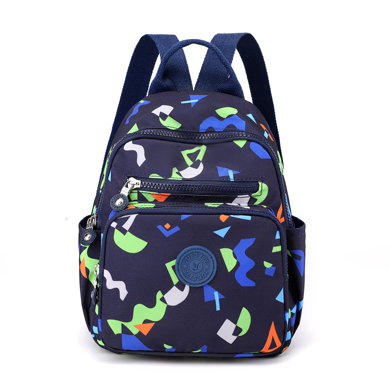 Nuevo estilo coreano mochila de mujer de moda de mediana edad y anciano madre viaje pequeña mochila de nylon mochila casual al por mayor