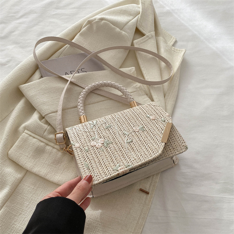 Diseño de nicho de alta sensación de tejido pequeño bolso cuadrado para mujeres 2024 nueva moda de paja bordada mochila de hombro
