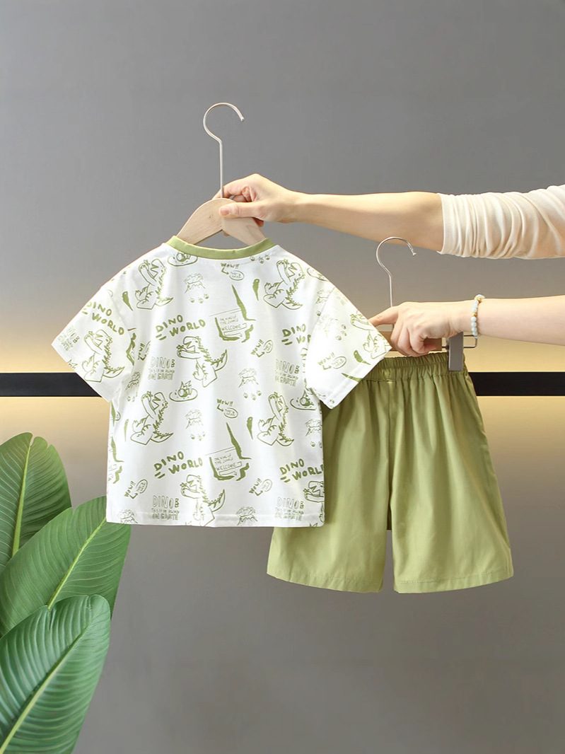 7277 Traje de verano para niños 2025 nuevo estilo estilo occidental dibujos animados para niños dinosaurio de manga corta bebé verano delgado dos piezas