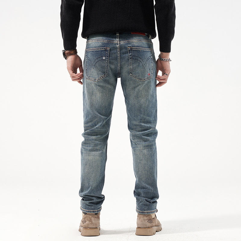 Jeans azules simples nostálgicos para hombres delgados recto otoño nuevo estilo con botas Martin pantalones de alta gama para hombres 2025