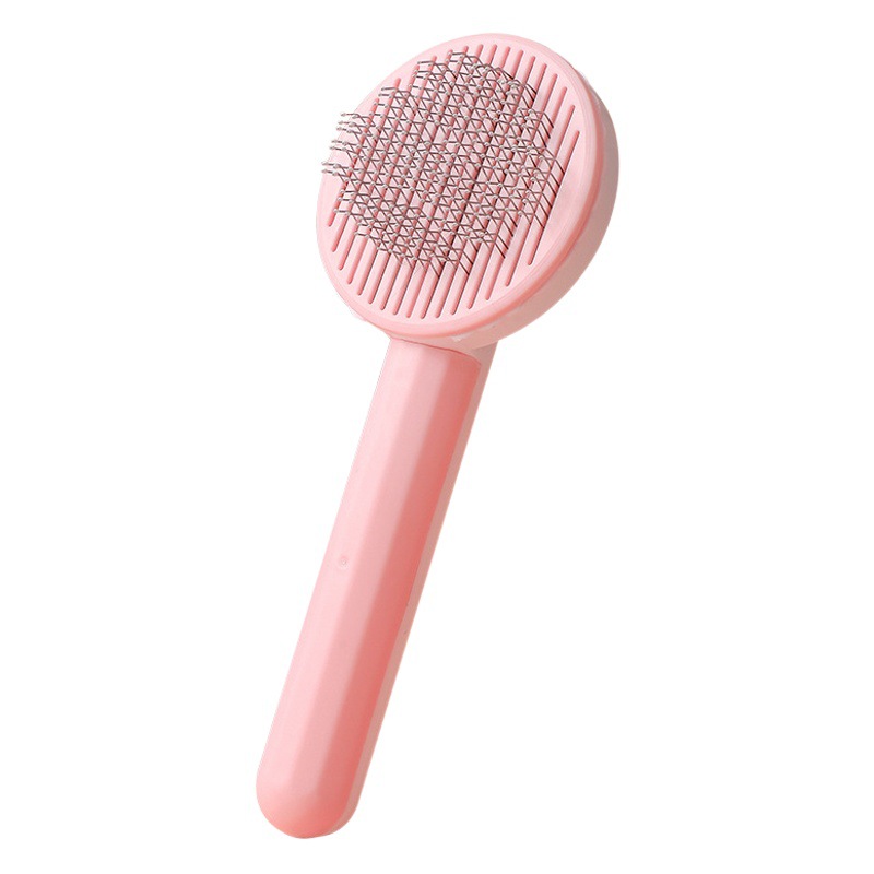 Peine para mascotas de acero inoxidable para eliminar el pelo flotante Peine de limpieza para gatos Macaron Productos de cepillo de masaje para mascotas al por mayor