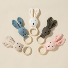 Baby comforter doll made of pure cotton gauze—safe for mouth contact! Includes an educational crib mobile rattle, handy hand puppets, and wooden ring toys.