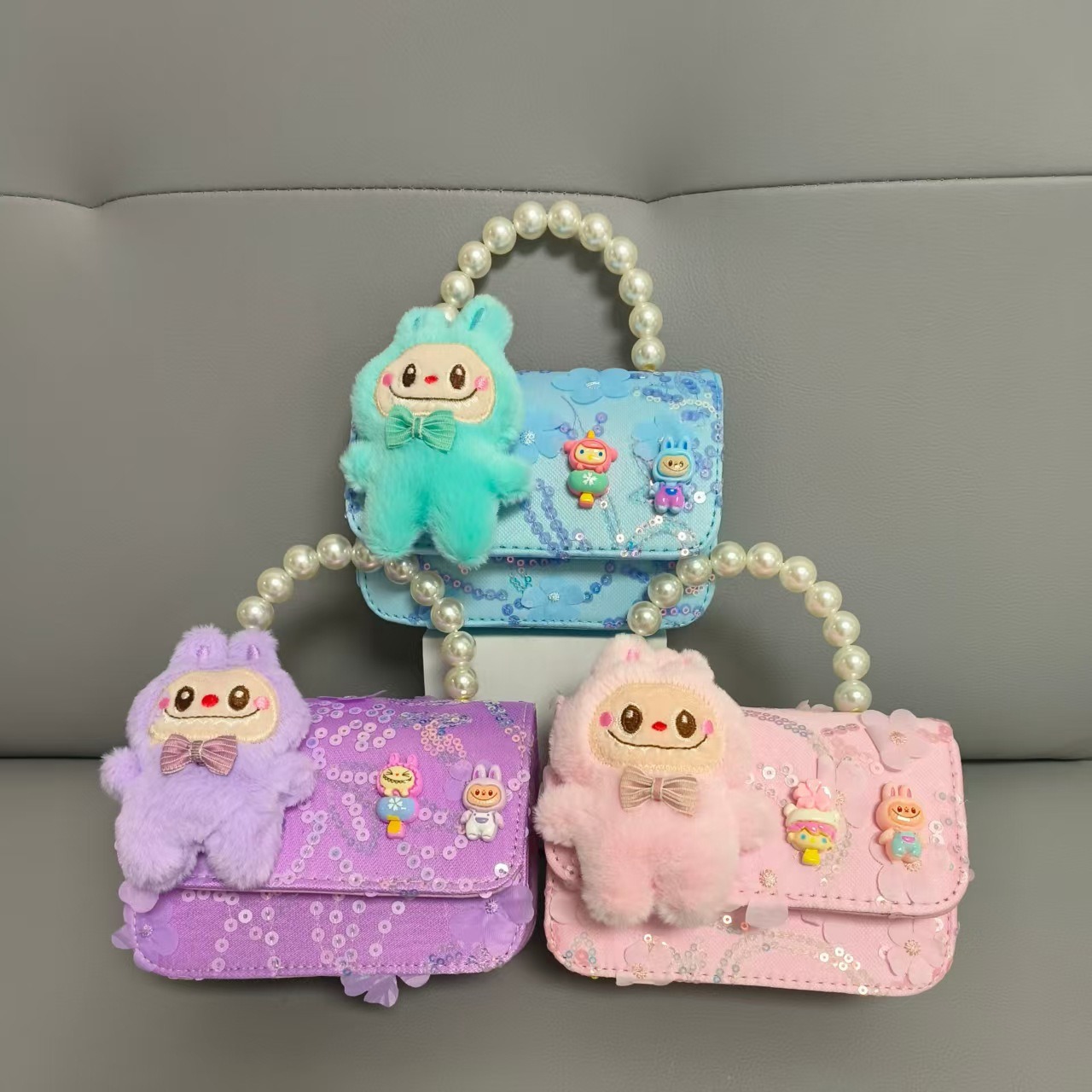 2025 nuevo bolso de perlas para niños bolso de cinturón con cuentas bolso de Año Nuevo para chicas bolso de muñecas accesorios bolso pequeño viento fragante