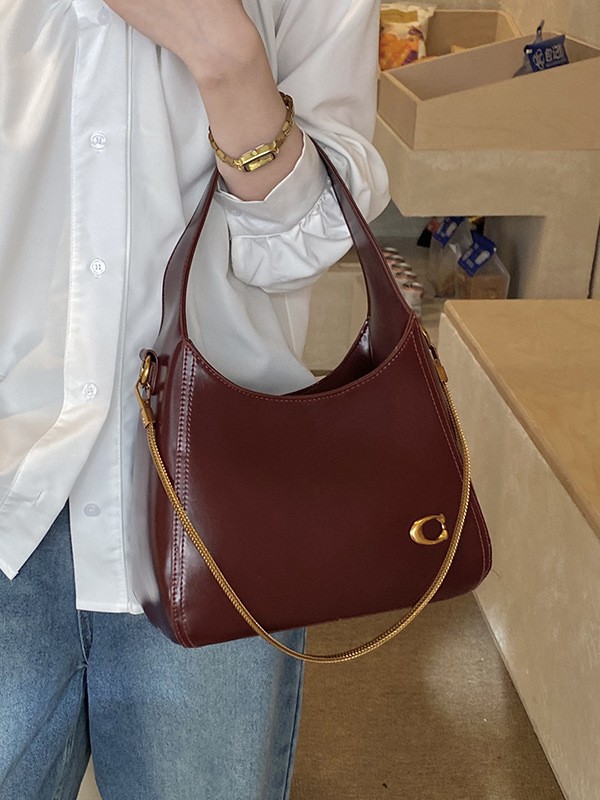 Bolsa de hombro Europa y América primavera y verano nuevo estilo perezoso bolso de brazo de viaje versátil de gran capacidad bolso de hombro de color sólido bolso de mujer