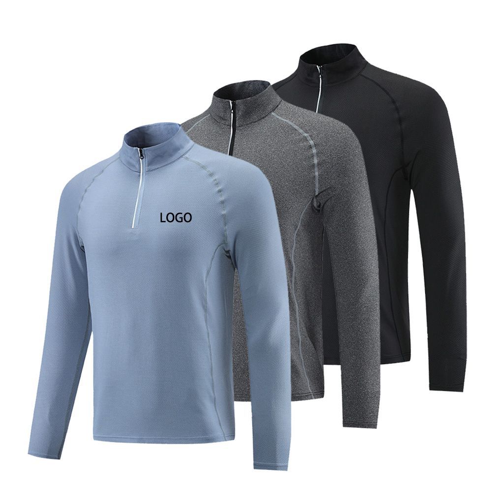 Ropa de entrenamiento de primavera y otoño para hombres de manga larga superior transpirable media cremallera collar de pie apretado correr ropa de secado rápido en stock al por mayor UA