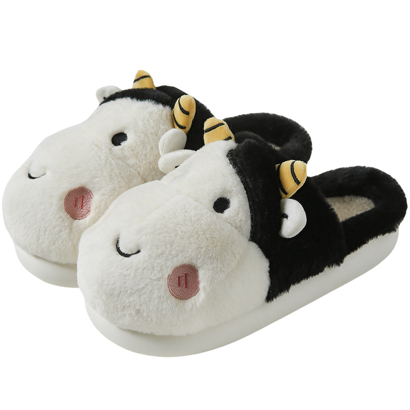 Pingüino Vaca Dibujos animados Zapatillas de algodón Hombres y mujeres Calidez antideslizante Baotou Zapatillas de algodón de felpa al por mayor