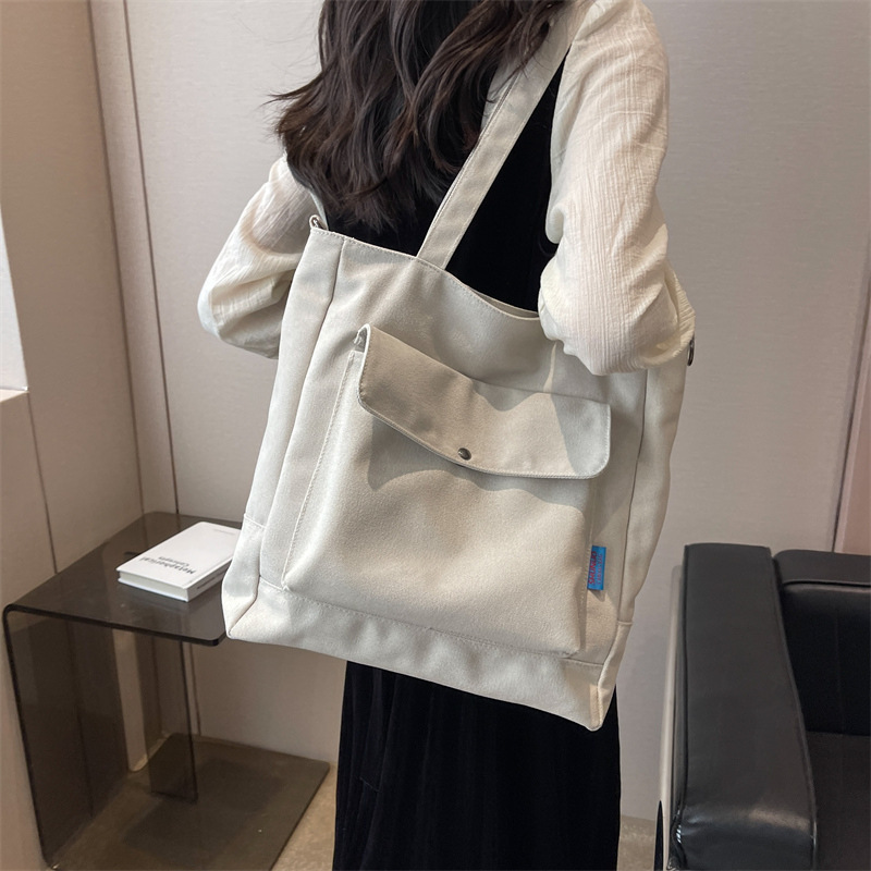 Los fabricantes venden al por mayor el nuevo bolso Tote para mujer bolso de lona de color sólido de gran capacidad bolso de mensajero de hombro casual de moda simple