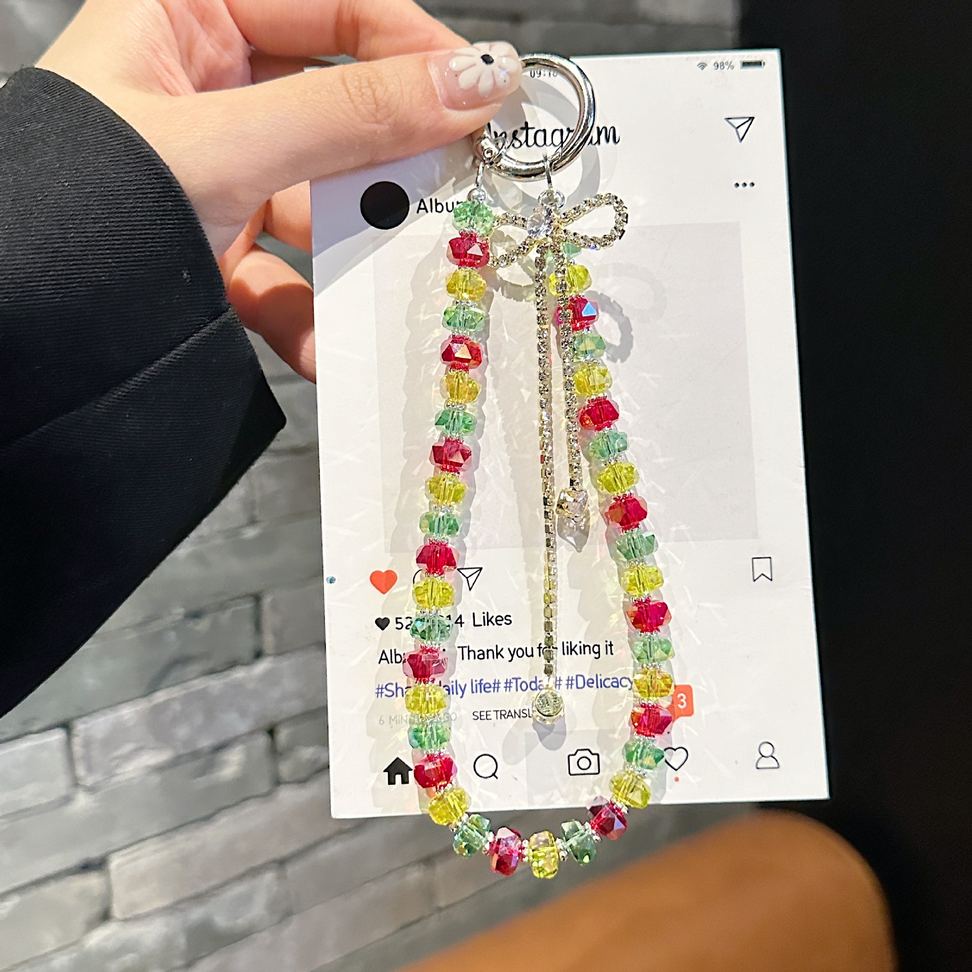 Boutique hecho a mano de alta gama para teléfono móvil cadena ins pulsera de diamantes de color femenino cordón de teléfono móvil de moda colgante de bolso corto