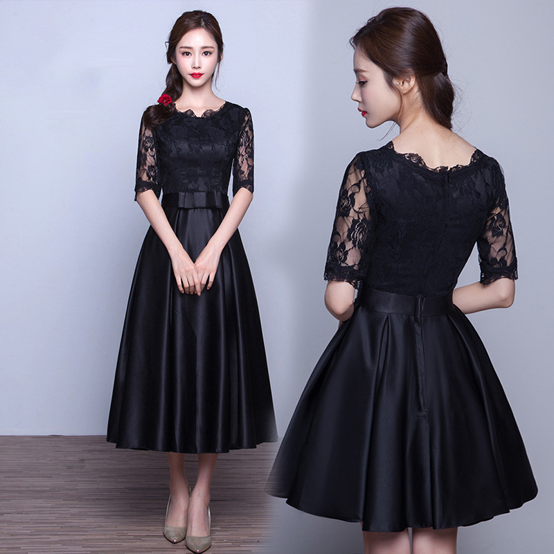 Black elegant long evening dress with a round collar
