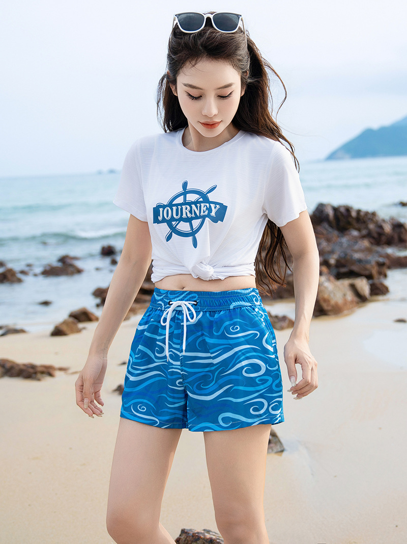 Pantalones de playa para hombres, vacaciones en el mar, pantalones cortos deportivos casuales para parejas, pantalones de baño de ángulo plano para mujeres.