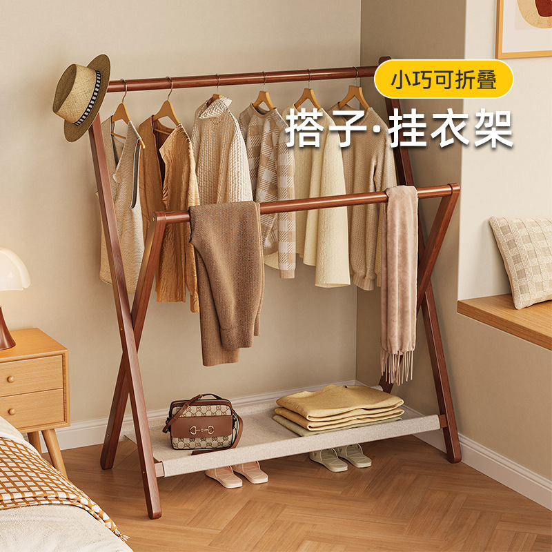 Percha de ropa colgante plegable en el piso del dormitorio para colocar ropa al lado de la cama, artefacto mágico, estante de acabado, percha de ropa doméstica simple