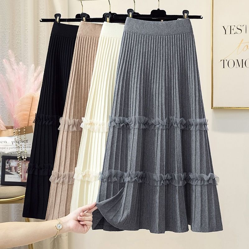Demi-season long knitted pleated skirt
