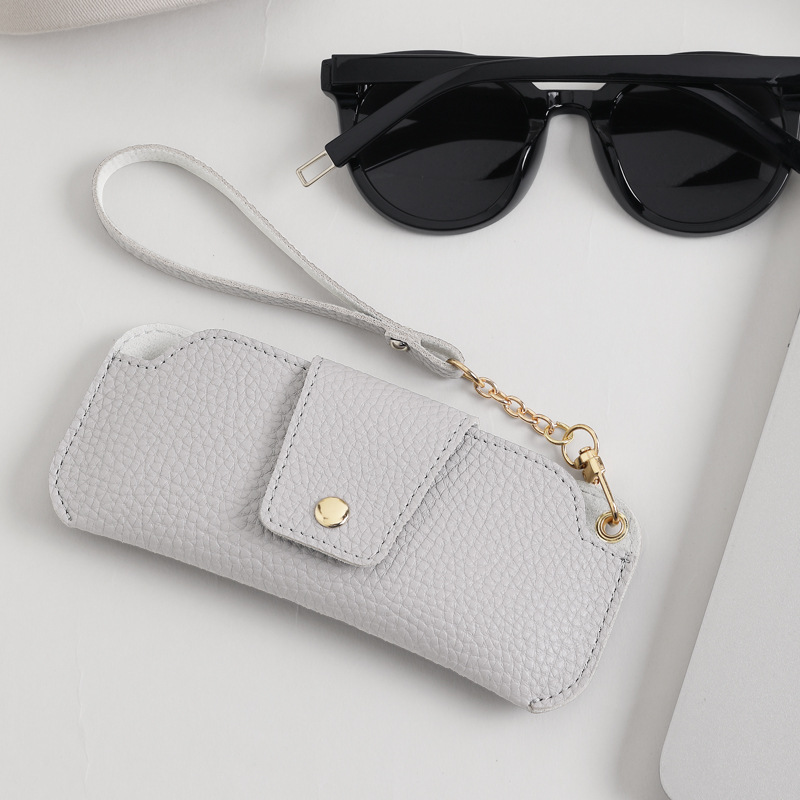 Bolsas de gafas de cuero unisex transfronterizas, bolsas de almacenamiento para gafas de sol, bolsas colgantes resistentes a la compresión y a prueba de pérdidas, bolsas de almacenamiento para gafas de sol