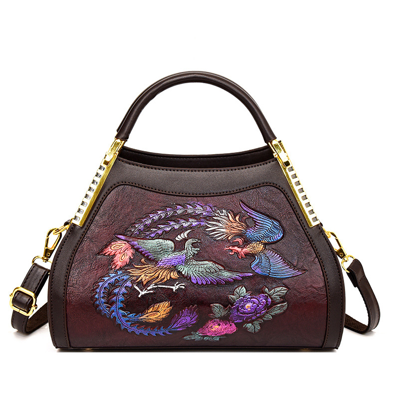 Luz de lujo de alta calidad retro nacional china en el viento de las madres mayores bolsas de mano en relieve de mujeres bolsas de hombro de un solo hombro