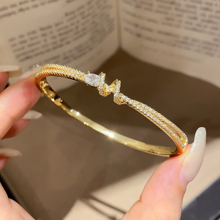 El temperamento francés arco de zircon pulsera de doble capa dulce ins pulsera de viento lujoso ligero de alto nivel sensación de joyas versátiles para mujeres
