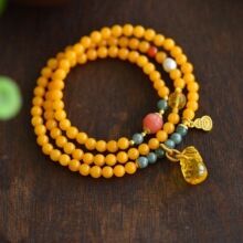 天然老蜜蜡三圈手串配琥珀钱袋子翡翠南红玛瑙尺寸约5.2毫米