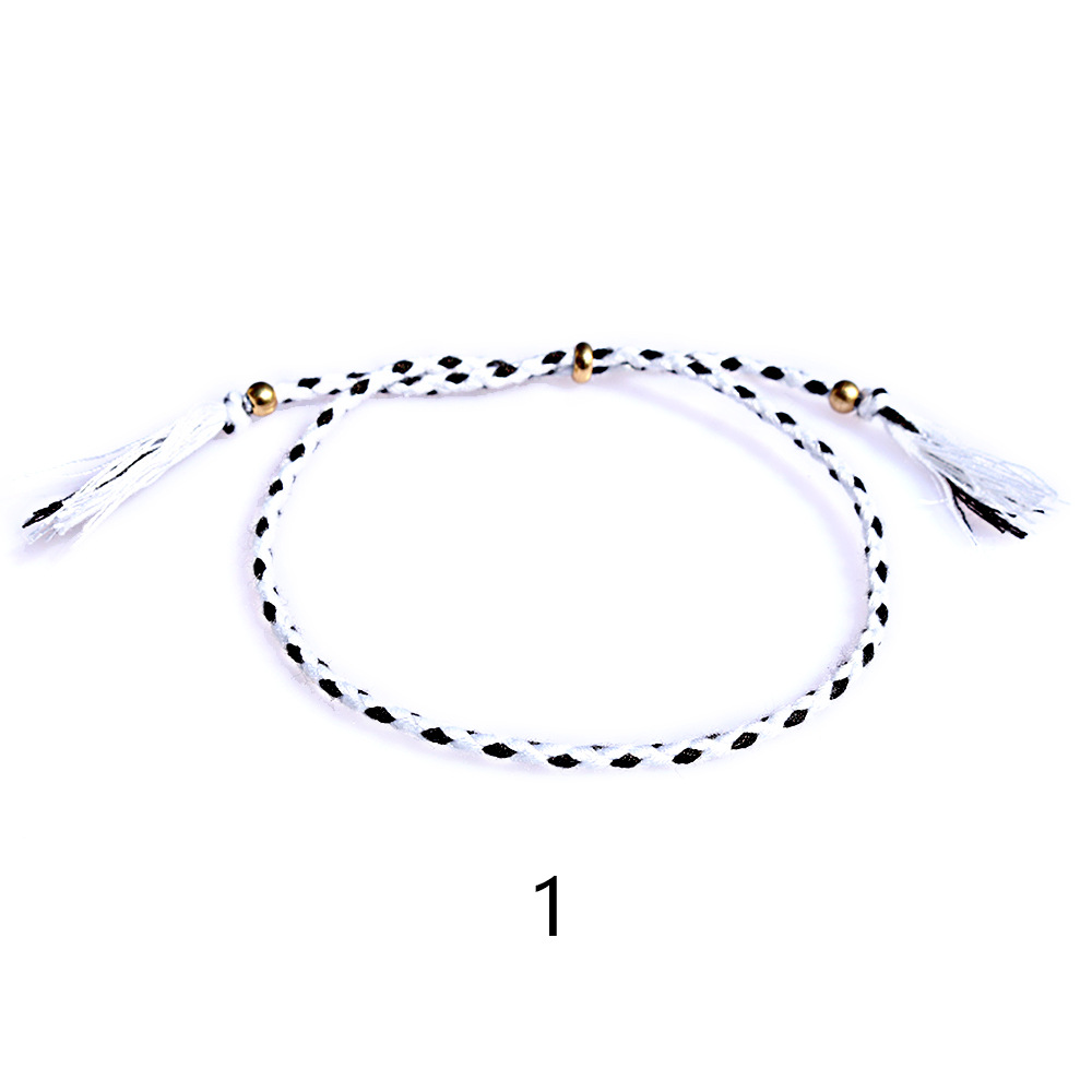 Amazon popular colorido cuerda de algodón amistad pulsera perlas de cobre borla pulsera tejida a mano ajustable hombres y mujeres pulsera
