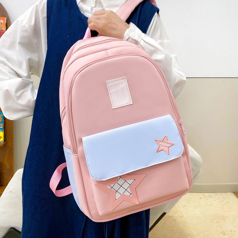 Mochila de estudiante de secundaria para mujer 2025 nuevo estilo ins versión coreana de alta apariencia y gran capacidad para estudiantes de secundaria estilo universitario mochila