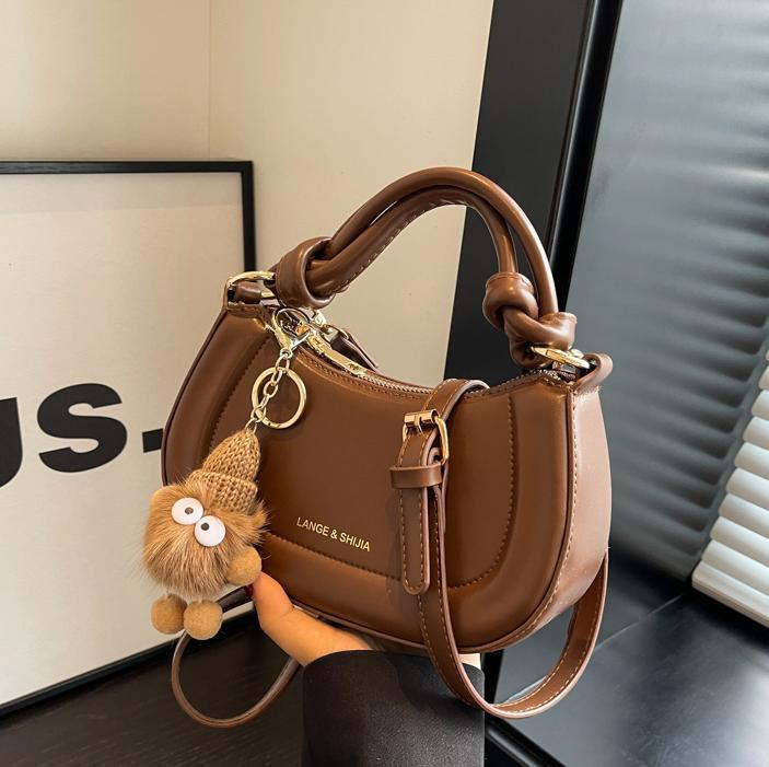 Bolso simple estilo explosivo de comercio exterior para mujer 2025 nuevo bolso de hombro casual salvaje textura bolso de mensajero de alta gama de moda