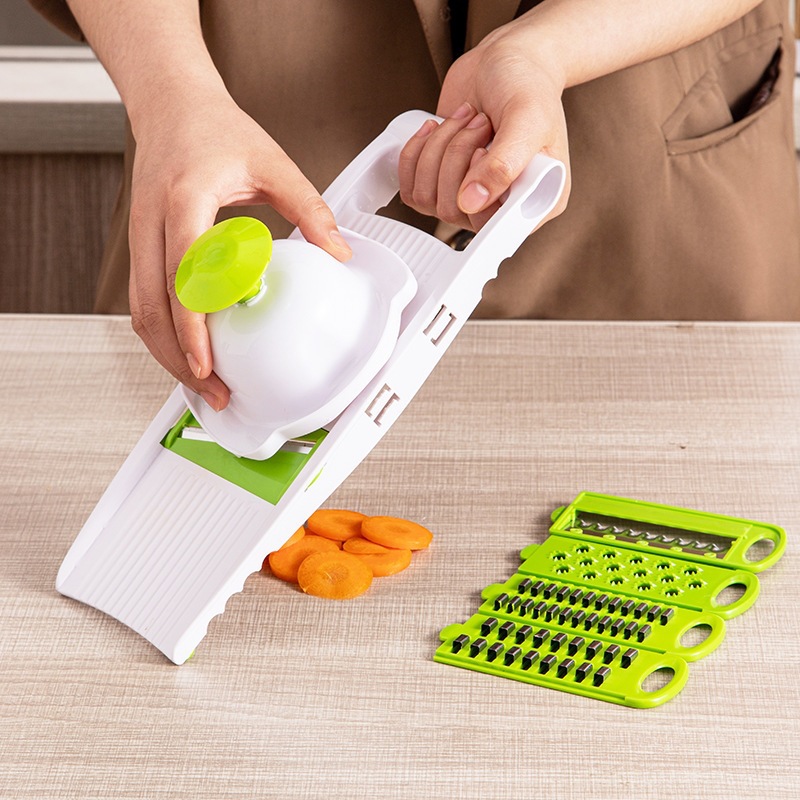 Multifunctional vegetable cutter, grater and slicer