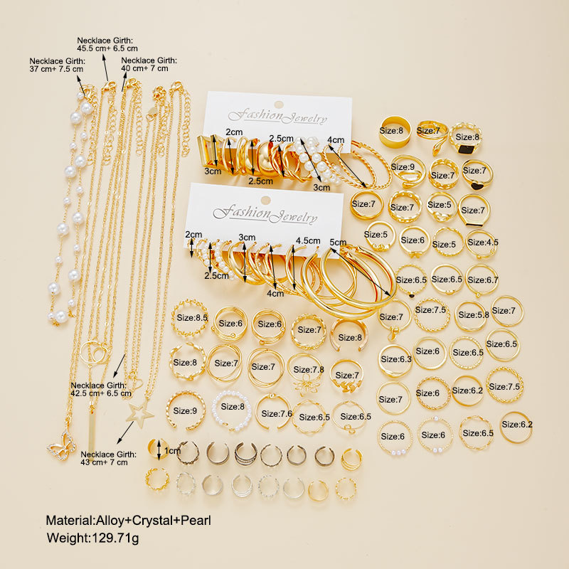 Europa y América transfronteriza nueva atmósfera creativa simple anillo de diamantes de perlas pendientes collar traje de oro al por mayor