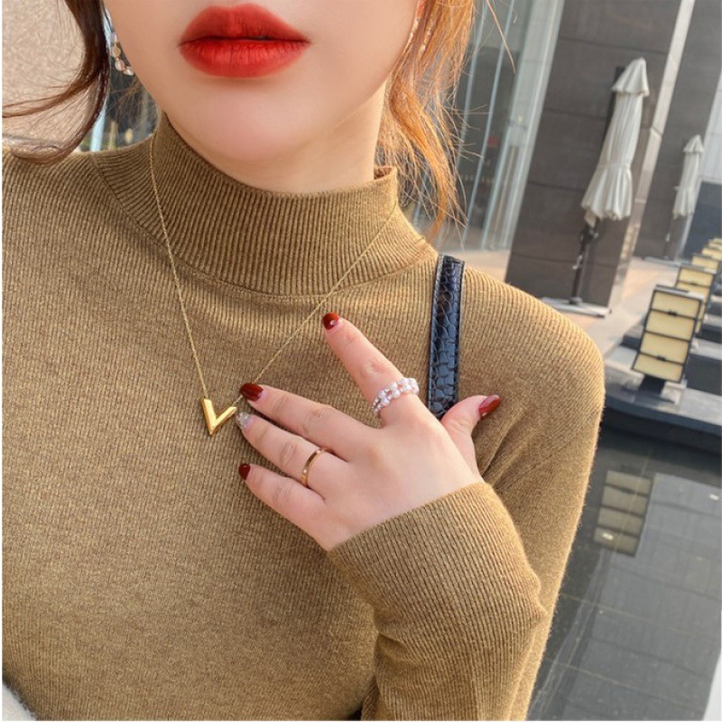 半高领打底衫女内搭秋冬洋气毛衣2022新款白色羊绒针织衫加绒