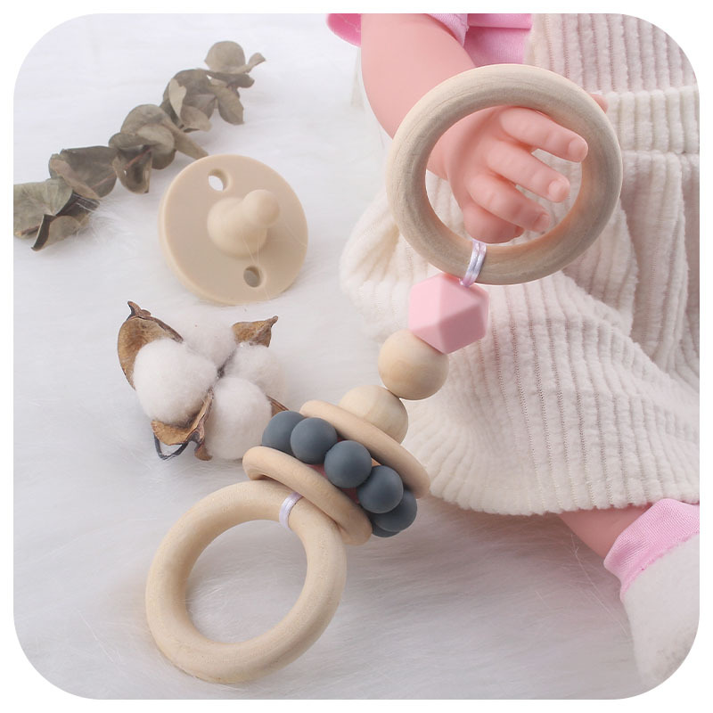 Mordedor creativo de juguete para niños nuevos Anillo Hemu bebé sonajero de mano ejercicio interactivo juguete de fortalecimiento dental palo de molienda