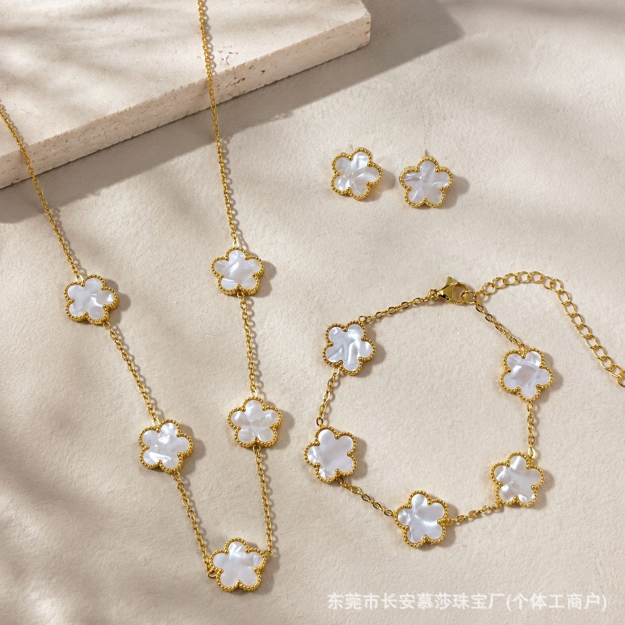 New Niche Luxury High-End Double-Sided Five-Leaf Clover Titanium Steel Necklace, Bracelet, and Earrings Three-Piece Set for Women, Cross-Border Wholesale