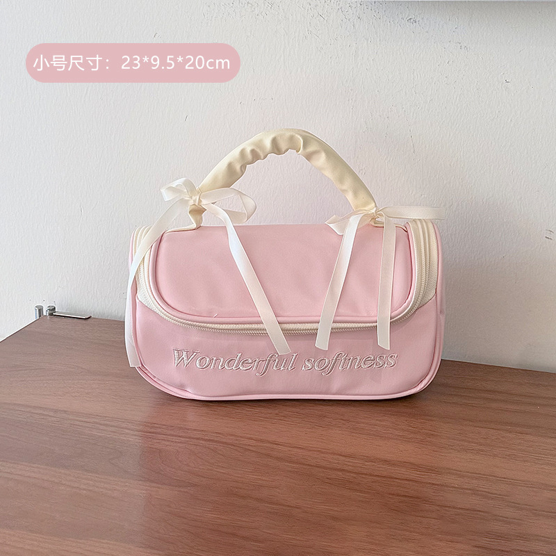 Bolsa de maquillaje de arco de corazón de niña portátil, bolsa de almacenamiento portátil, bolsa de lavado impermeable de gran capacidad