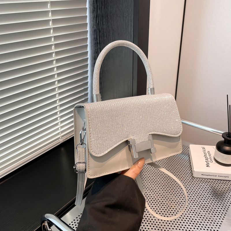 Modesta pequeña atmósfera fresca y simple bolso cuadrado de verano 2025, nueva dama sensación de estilo extranjero dulce mochila de hombro