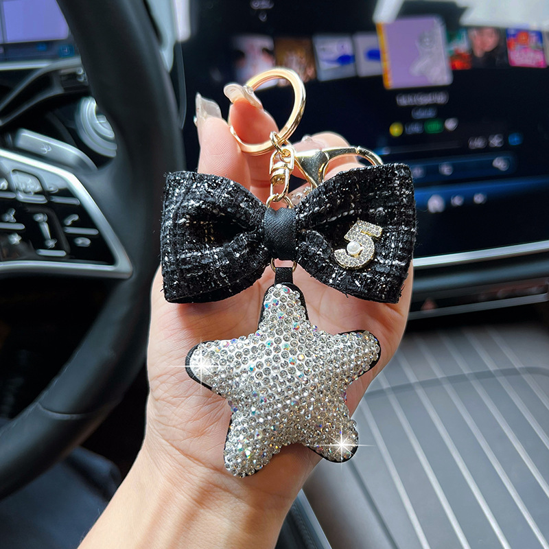 Cerámica creativa con diamantes de arcilla de cinco puntas arco pequeño llavero de viento fragante nuevo cuero estrella bolsa decoración colgante