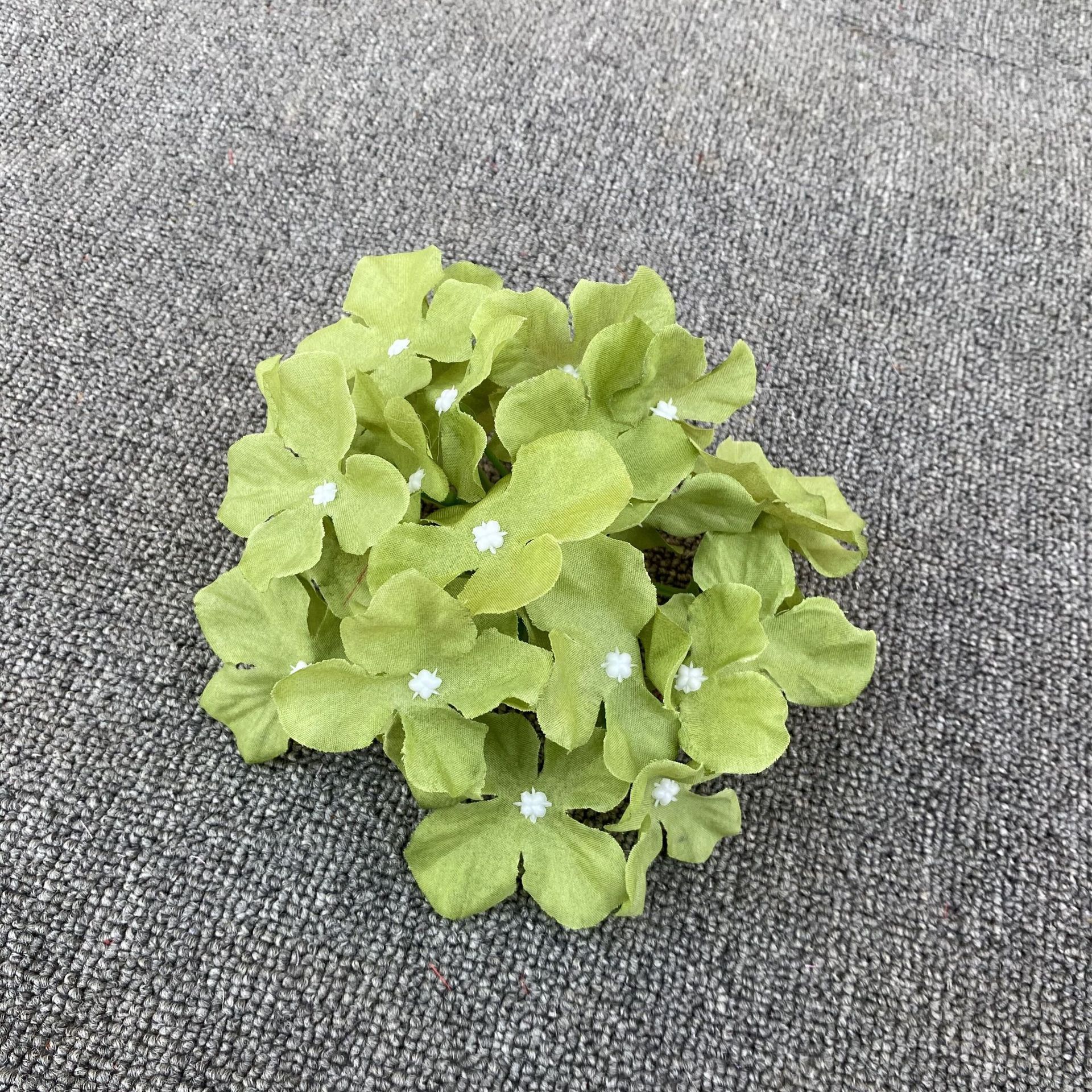 Hydrangea head with pole in autumn green