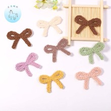 电脑绣花厂新款刺绣辅料补丁布贴时尚镂空涤纶毛线蝴蝶结刺绣布贴